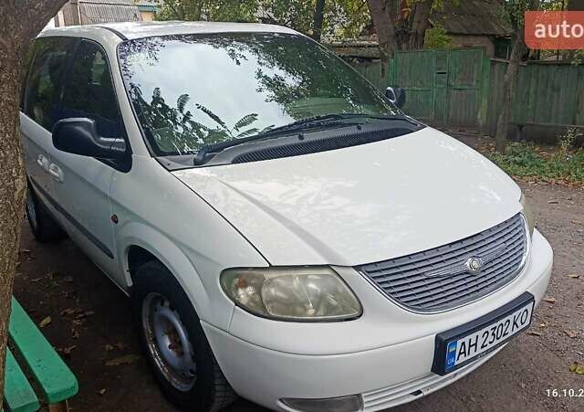 Білий Додж Гранд Караван, об'ємом двигуна 2.5 л та пробігом 316 тис. км за 5000 $, фото 1 на Automoto.ua