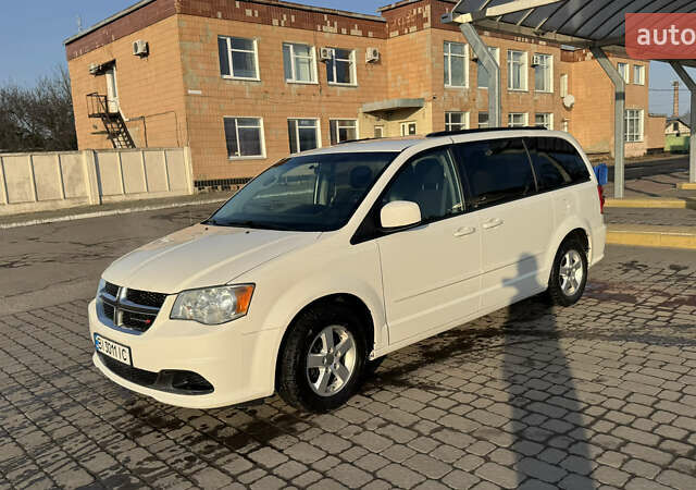 Белый Додж Гранд Караван, объемом двигателя 3.61 л и пробегом 212 тыс. км за 12000 $, фото 1 на Automoto.ua