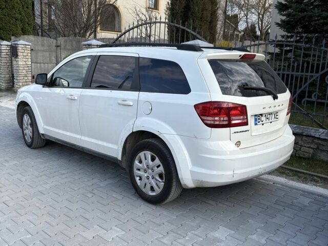 Білий Додж Гранд Караван, об'ємом двигуна 2.4 л та пробігом 70 тис. км за 11959 $, фото 1 на Automoto.ua