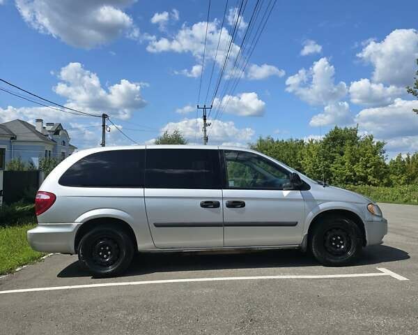 Серый Додж Гранд Караван, объемом двигателя 3.3 л и пробегом 68 тыс. км за 8600 $, фото 1 на Automoto.ua