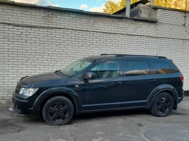 Черный Додж Джорни, объемом двигателя 2 л и пробегом 326 тыс. км за 5058 $, фото 1 на Automoto.ua