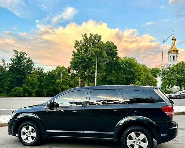 Черный Додж Джорни, объемом двигателя 2.4 л и пробегом 154 тыс. км за 8900 $, фото 1 на Automoto.ua