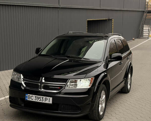 Черный Додж Джорни, объемом двигателя 2.36 л и пробегом 161 тыс. км за 9900 $, фото 1 на Automoto.ua