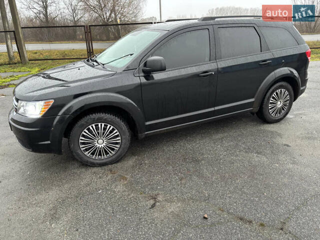 Черный Додж Джорни, объемом двигателя 2.36 л и пробегом 210 тыс. км за 9900 $, фото 1 на Automoto.ua