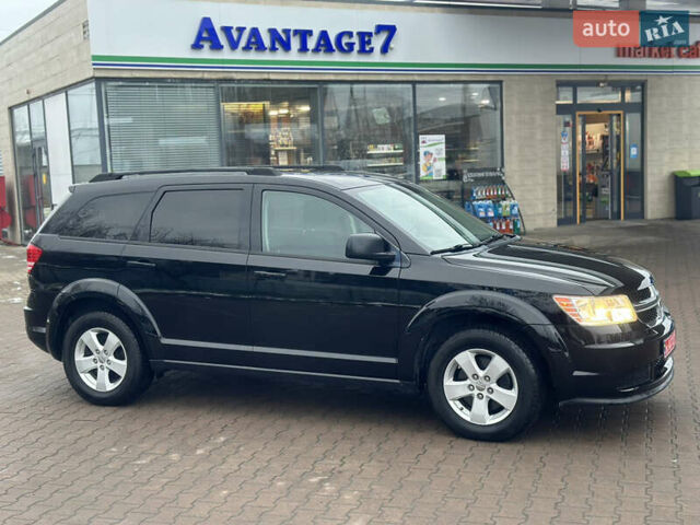 Черный Додж Джорни, объемом двигателя 2.4 л и пробегом 203 тыс. км за 11750 $, фото 1 на Automoto.ua