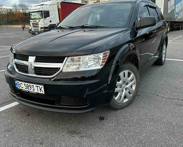 Черный Додж Джорни, объемом двигателя 2.36 л и пробегом 280 тыс. км за 11950 $, фото 1 на Automoto.ua