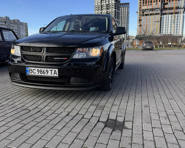 Черный Додж Джорни, объемом двигателя 2.36 л и пробегом 221 тыс. км за 11800 $, фото 1 на Automoto.ua