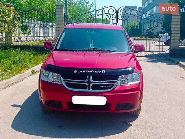 Красный Додж Джорни, объемом двигателя 2.36 л и пробегом 133 тыс. км за 10500 $, фото 1 на Automoto.ua