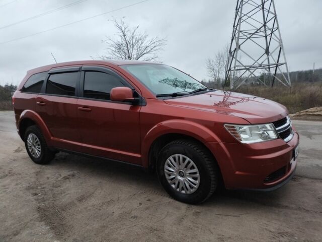 Помаранчевий Додж Джорні, об'ємом двигуна 2.4 л та пробігом 140 тис. км за 5700 $, фото 1 на Automoto.ua