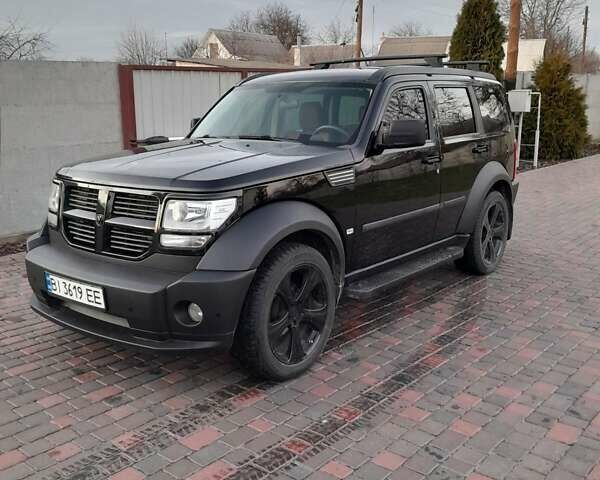 Черный Додж Нитро, объемом двигателя 3.7 л и пробегом 270 тыс. км за 9500 $, фото 1 на Automoto.ua