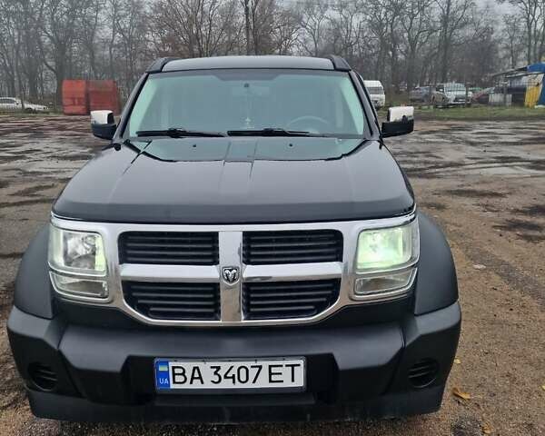 Черный Додж Нитро, объемом двигателя 3.7 л и пробегом 248 тыс. км за 8500 $, фото 1 на Automoto.ua