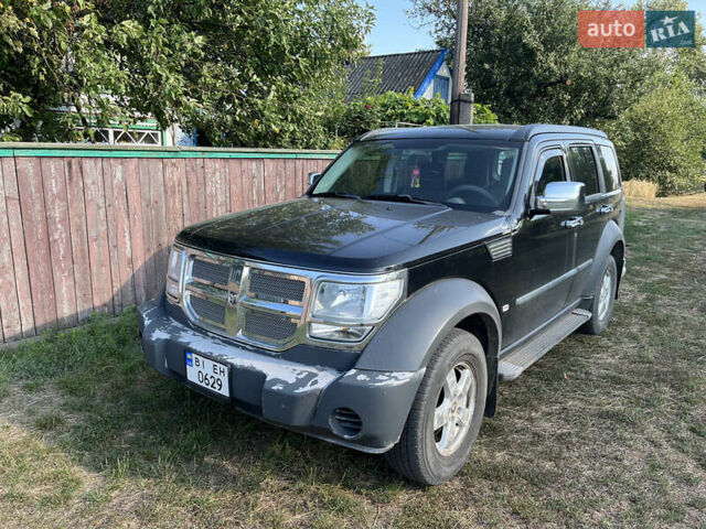 Черный Додж Нитро, объемом двигателя 3.7 л и пробегом 237 тыс. км за 7200 $, фото 1 на Automoto.ua