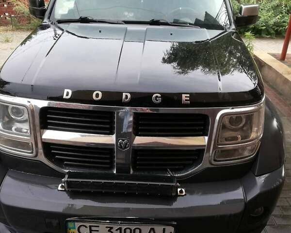 Чорний Додж Nitro, об'ємом двигуна 2.8 л та пробігом 230 тис. км за 10500 $, фото 1 на Automoto.ua