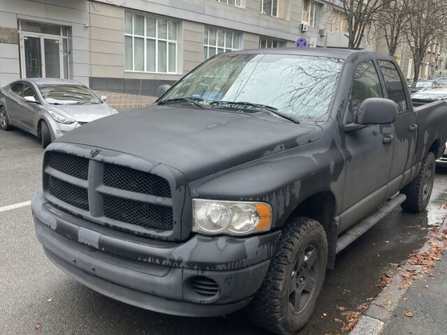 Черный Додж РАМ, объемом двигателя 4.7 л и пробегом 130 тыс. км за 5000 $, фото 1 на Automoto.ua