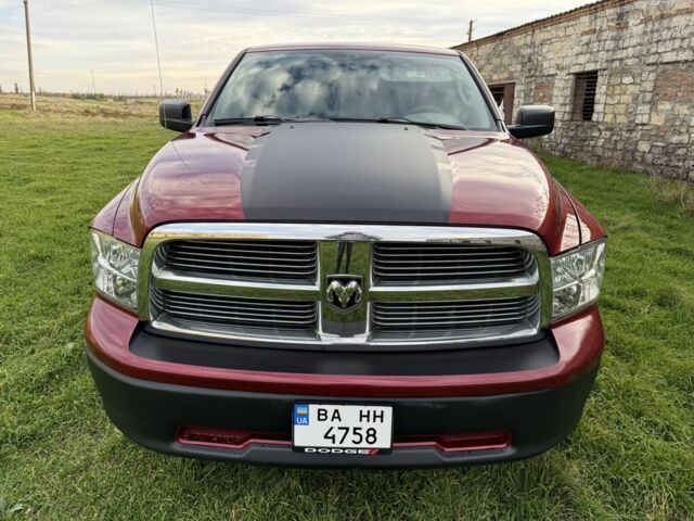 Красный Додж РАМ, объемом двигателя 4.7 л и пробегом 205 тыс. км за 9800 $, фото 1 на Automoto.ua