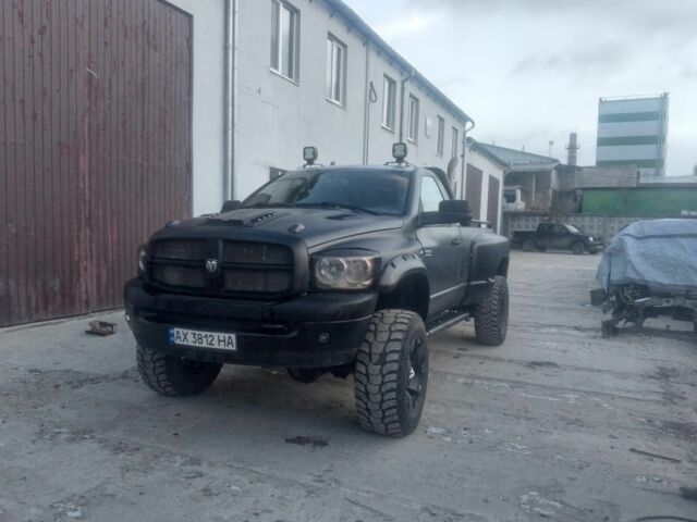 Сірий Додж RAM, об'ємом двигуна 5.9 л та пробігом 75 тис. км за 14900 $, фото 1 на Automoto.ua