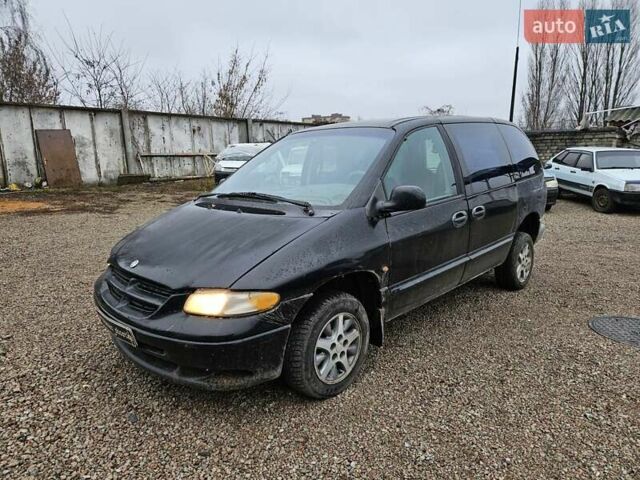 Черный Додж Рам Ван, объемом двигателя 2.5 л и пробегом 127 тыс. км за 2450 $, фото 1 на Automoto.ua