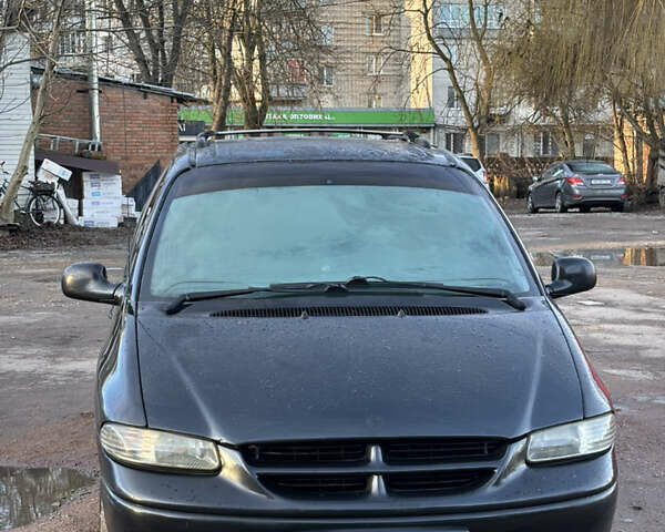 Черный Додж Рам Ван, объемом двигателя 2.5 л и пробегом 500 тыс. км за 3300 $, фото 1 на Automoto.ua