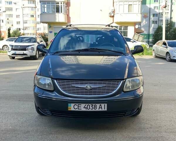 Черный Додж Рам Ван, объемом двигателя 2.5 л и пробегом 435 тыс. км за 3800 $, фото 1 на Automoto.ua