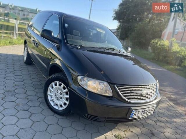 Черный Додж Рам Ван, объемом двигателя 2.5 л и пробегом 297 тыс. км за 3950 $, фото 1 на Automoto.ua