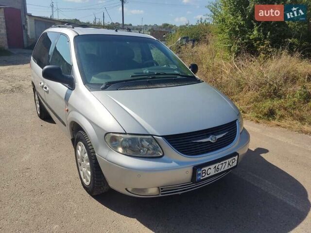Серый Додж Рам Ван, объемом двигателя 2.5 л и пробегом 409 тыс. км за 3500 $, фото 1 на Automoto.ua