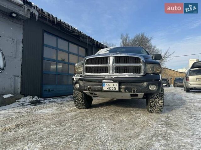 Черный Додж RAM 1500, объемом двигателя 4.7 л и пробегом 166 тыс. км за 15500 $, фото 1 на Automoto.ua