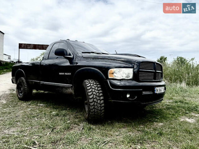 Черный Додж RAM 1500, объемом двигателя 4.7 л и пробегом 82 тыс. км за 8700 $, фото 1 на Automoto.ua