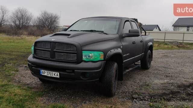 Черный Додж RAM 2500, объемом двигателя 5.65 л и пробегом 300 тыс. км за 15000 $, фото 1 на Automoto.ua