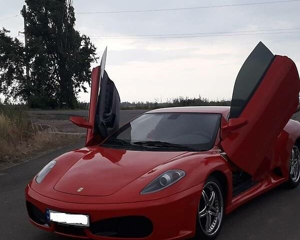 Красный Феррари Ф430, объемом двигателя 3 л и пробегом 30 тыс. км за 35000 $, фото 1 на Automoto.ua