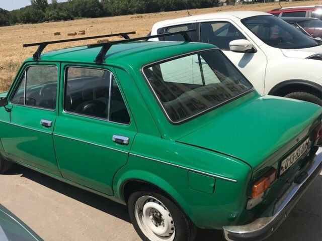 Зеленый Фиат 128, объемом двигателя 1.1 л и пробегом 1000 тыс. км за 600 $, фото 1 на Automoto.ua