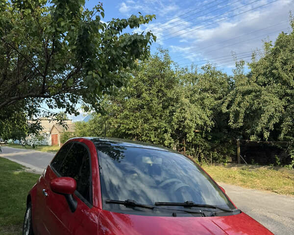 Красный Фиат 500, объемом двигателя 1.24 л и пробегом 96 тыс. км за 6600 $, фото 1 на Automoto.ua