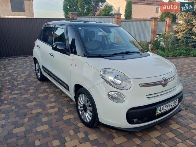 Белый Фиат 500L, объемом двигателя 1.25 л и пробегом 118 тыс. км за 7900 $, фото 1 на Automoto.ua