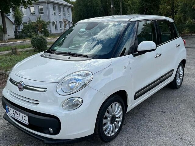 Белый Фиат 500L, объемом двигателя 1.2 л и пробегом 177 тыс. км за 7800 $, фото 1 на Automoto.ua