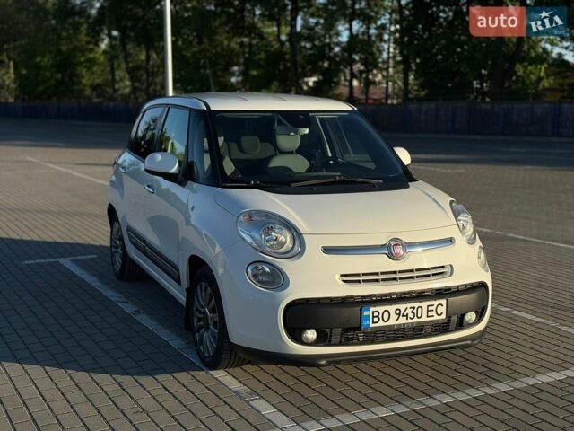 Белый Фиат 500L, объемом двигателя 1.25 л и пробегом 121 тыс. км за 8900 $, фото 1 на Automoto.ua