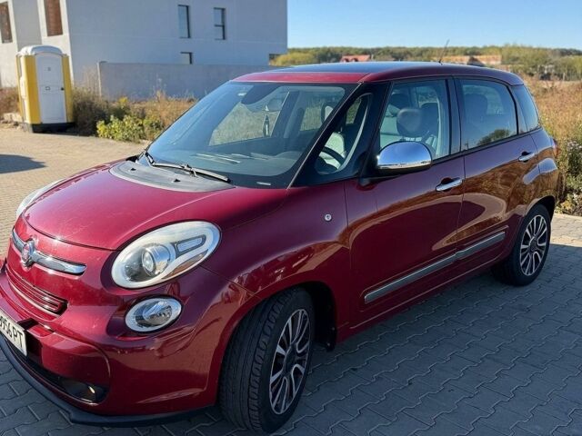 Красный Фиат 500L, объемом двигателя 1.37 л и пробегом 128 тыс. км за 8400 $, фото 1 на Automoto.ua