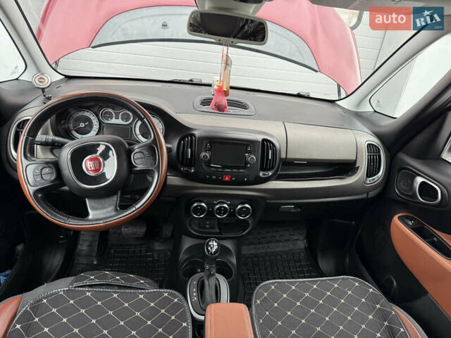 Красный Фиат 500L, объемом двигателя 1.4 л и пробегом 100 тыс. км за 9000 $, фото 1 на Automoto.ua