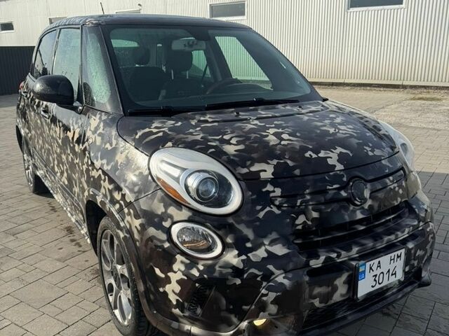 Красный Фиат 500L, объемом двигателя 1.4 л и пробегом 95 тыс. км за 6750 $, фото 1 на Automoto.ua