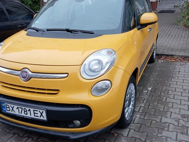 Желтый Фиат 500L, объемом двигателя 0.88 л и пробегом 111 тыс. км за 8200 $, фото 1 на Automoto.ua