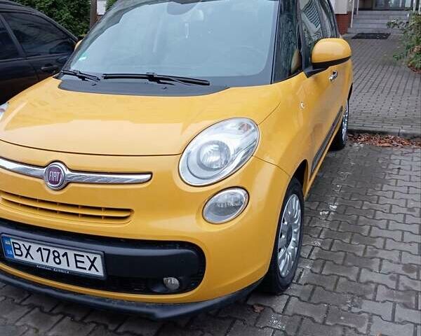 Желтый Фиат 500L, объемом двигателя 0.88 л и пробегом 111 тыс. км за 8200 $, фото 1 на Automoto.ua