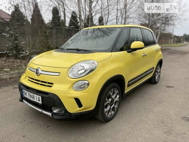 Желтый Фиат 500L, объемом двигателя 1.3 л и пробегом 76 тыс. км за 11000 $, фото 1 на Automoto.ua