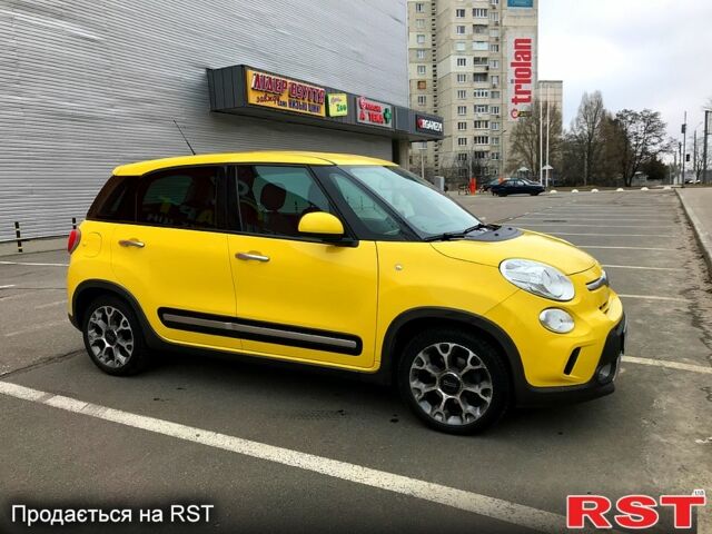 Желтый Фиат 500L, объемом двигателя 1.2 л и пробегом 78 тыс. км за 10900 $, фото 1 на Automoto.ua