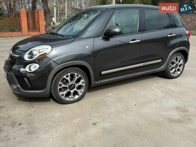 Серый Фиат 500L, объемом двигателя 1.37 л и пробегом 76 тыс. км за 8600 $, фото 1 на Automoto.ua