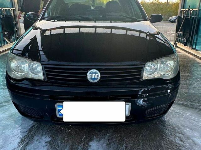 Черный Фиат Альбеа, объемом двигателя 1.4 л и пробегом 320 тыс. км за 3000 $, фото 1 на Automoto.ua