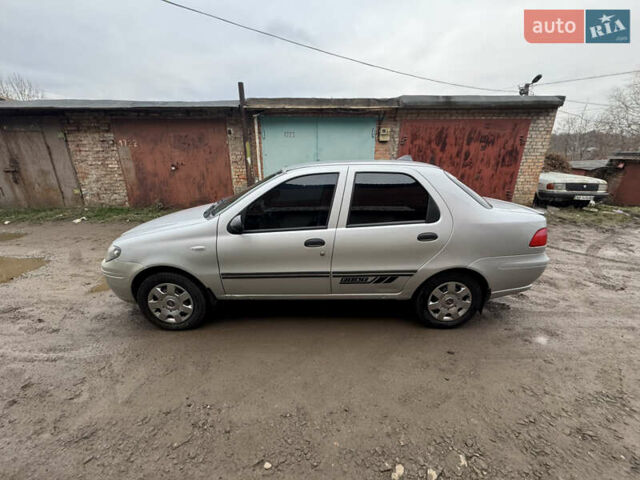 Серый Фиат Альбеа, объемом двигателя 1.4 л и пробегом 160 тыс. км за 2850 $, фото 1 на Automoto.ua