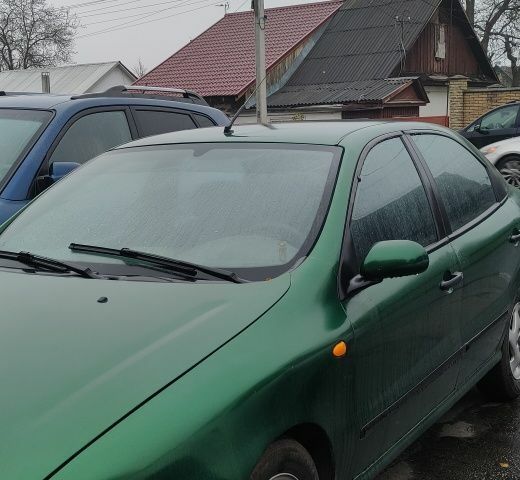 Зеленый Фиат Брава, объемом двигателя 1.4 л и пробегом 278 тыс. км за 1144 $, фото 1 на Automoto.ua