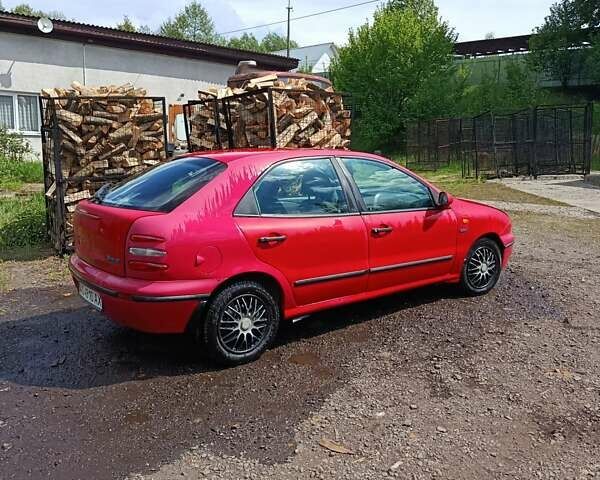Красный Фиат Браво, объемом двигателя 1.4 л и пробегом 230 тыс. км за 1500 $, фото 1 на Automoto.ua