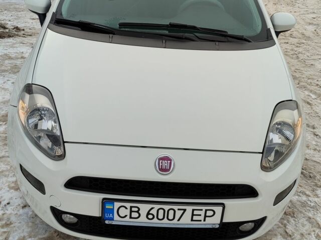 Белый Фиат Гранде Пунто, объемом двигателя 1.4 л и пробегом 107 тыс. км за 6000 $, фото 1 на Automoto.ua