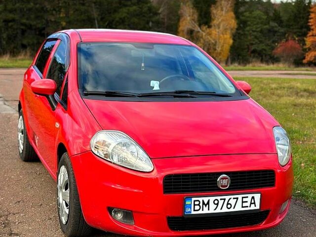 Красный Фиат Гранде Пунто, объемом двигателя 1.4 л и пробегом 208 тыс. км за 4700 $, фото 1 на Automoto.ua