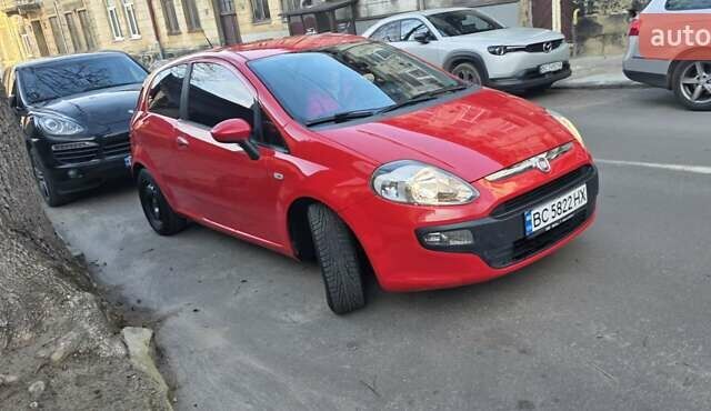 Красный Фиат Гранде Пунто, объемом двигателя 1.24 л и пробегом 160 тыс. км за 4800 $, фото 1 на Automoto.ua