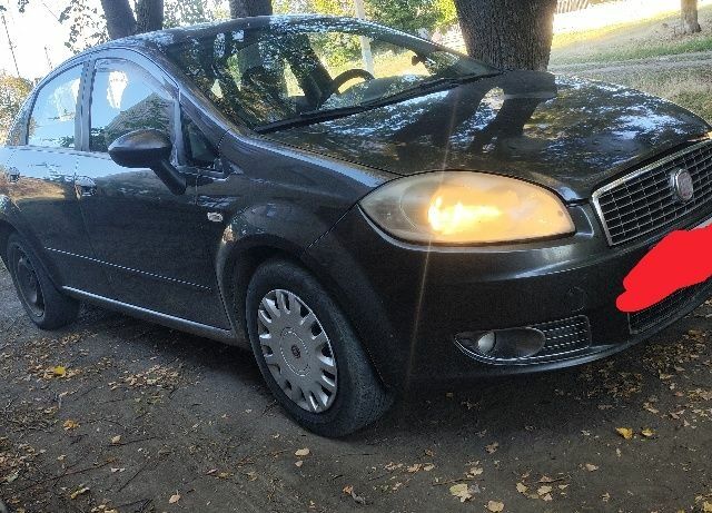 Серый Фиат Линеа, объемом двигателя 1.2 л и пробегом 488 тыс. км за 2100 $, фото 1 на Automoto.ua